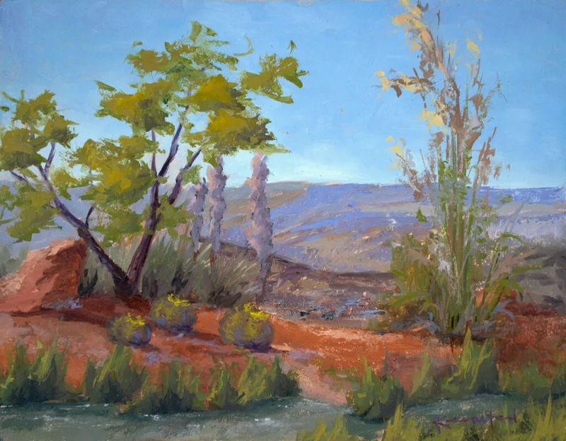 plein air desert landscape with trees red soil distant hills and grasses