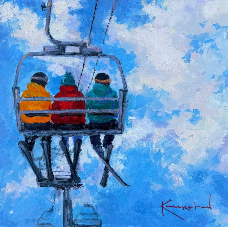Three bundled skiers riding a chairlift against bright cloud-filled blue sky
