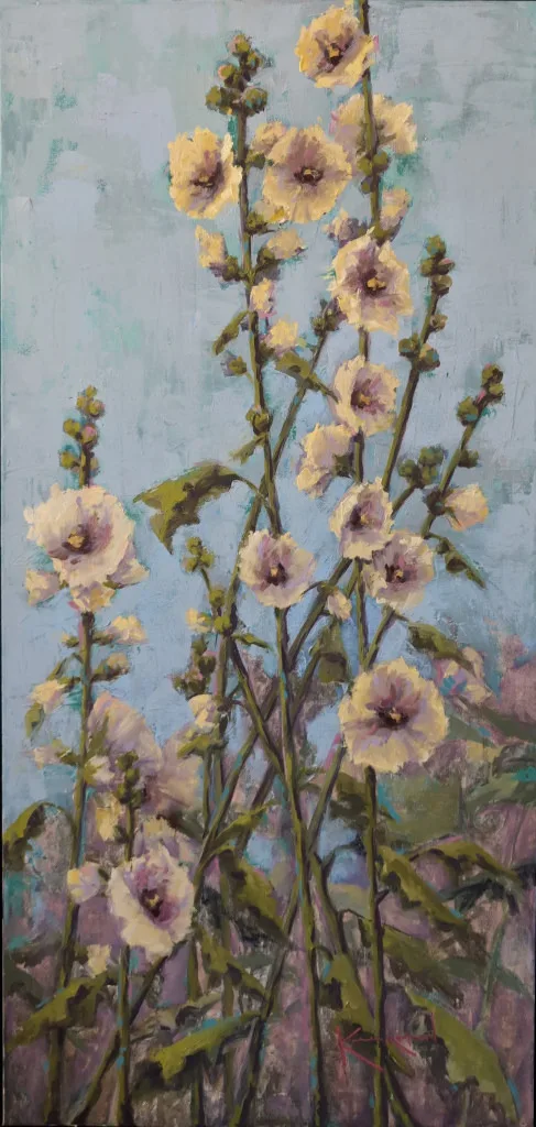 Tall stalks of pale pink and white hollyhocks reaching upward, vertical composition.
