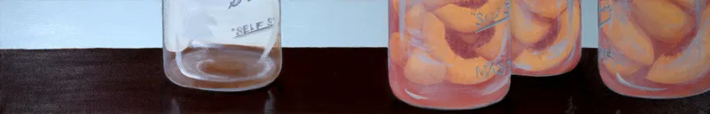 Row of glass mason jars filled with canned peach slices on dark counter